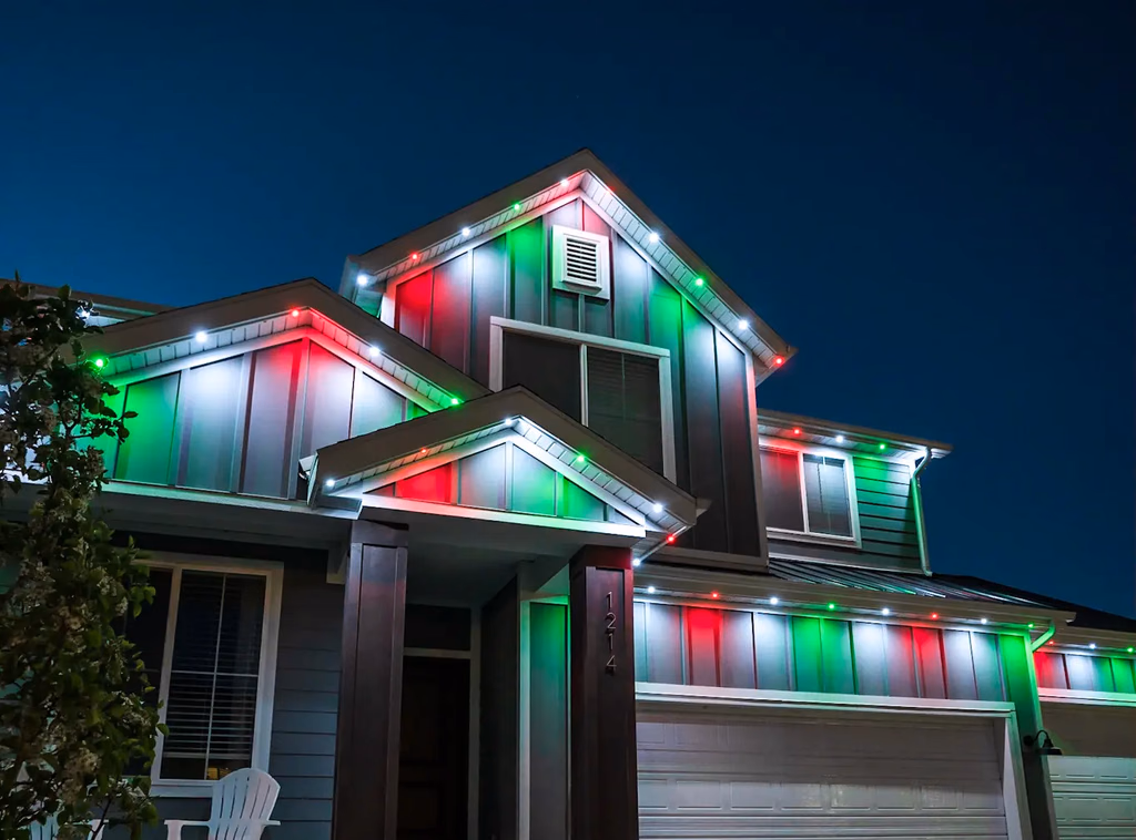 Home with red, green, and white permanent lights